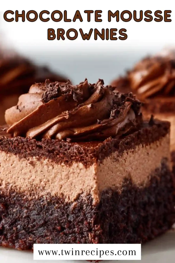 Homemade Chocolate Mousse Brownies topped with shiny ganache glaze.