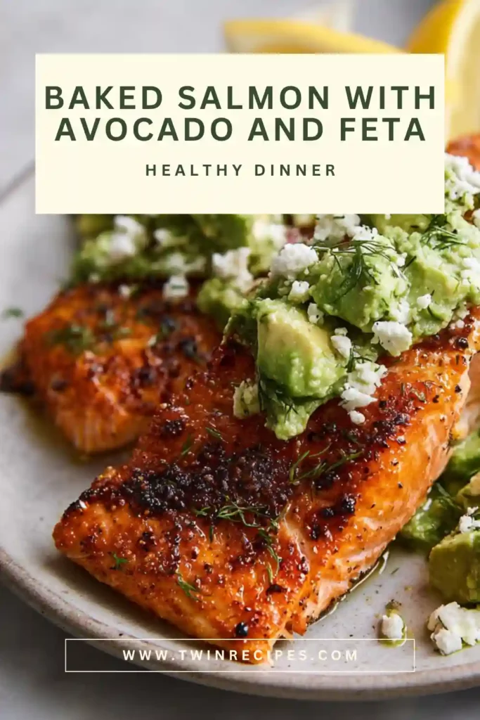 Healthy baked salmon served with lemon and herbs.