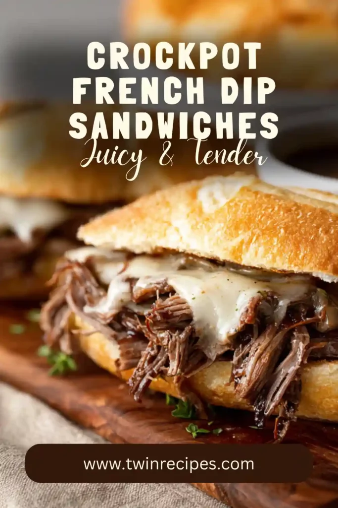 Crockpot French dip sandwiches with melted cheese and au jus for dipping.