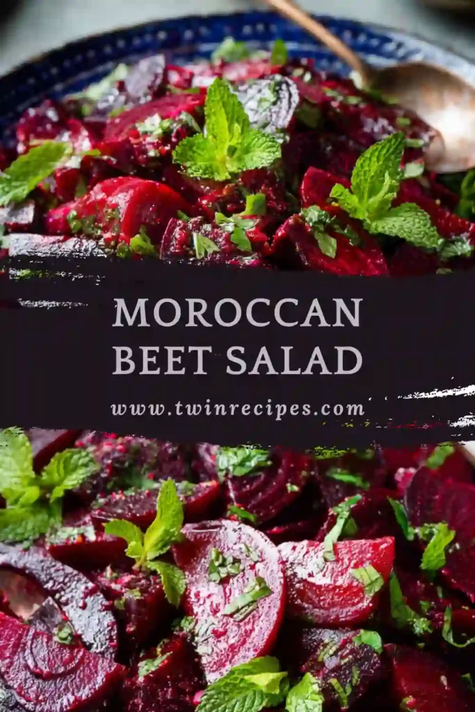 Vibrant Moroccan Beet Salad with roasted beets, orange zest, and fresh herbs served in a white bowl.