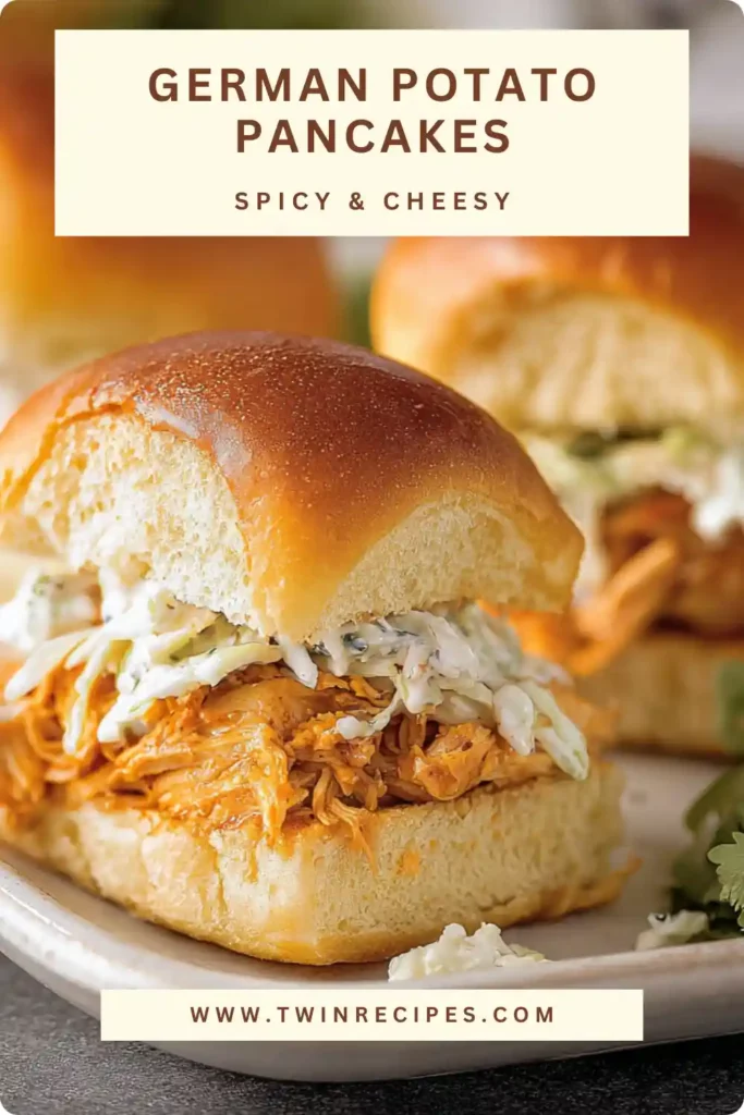 Golden baked buffalo chicken slider filled with melted cheese and shredded spicy chicken.