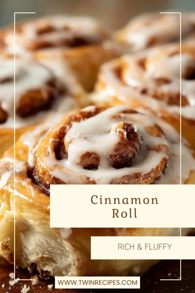 Close-up of freshly baked cinnamon rolls just out of the oven with icing dripping.