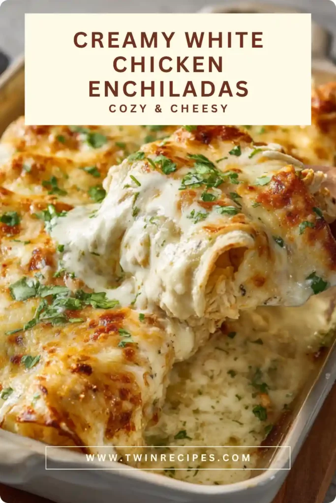 Sliced enchiladas topped with sour cream sauce and cheese.