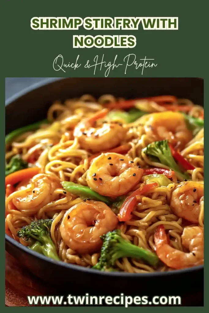 Skillet of shrimp noodle stir fry with steam rising and chopsticks nearby.