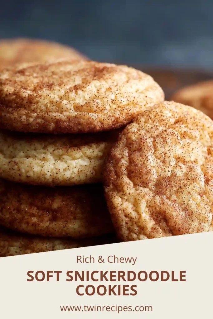 soft snickerdoodle cookies stacked on a plate